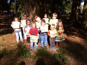 Ortega Hills Preschool at Children from Ortega Hills Preschool in Clay County show off their new "Spookley" books at the Amazing Grace Crop Maze.