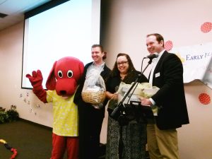 Early Learning Coalition of North Florida's (ELC) 2015 Preschool Teacher of the Year presented to Zoe Messer at the Early Educator's Conference, Thrasher-Horne Center January 23, 2016 by ELC board member Brian Graham and Teacher of the Year sponsor representative Brian Williams, Kaplan Early Learning Company.